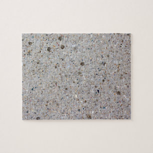 Rompecabezas concreto del diseño de la foto