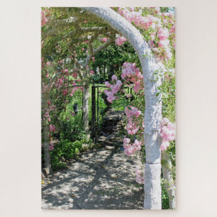Rompecabezas rosado hermoso del arco de la flor