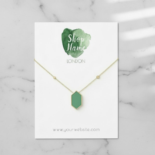 Ropa de pintura verde, tarjeta de visualización de (Green paint splash, jewellery display card.)