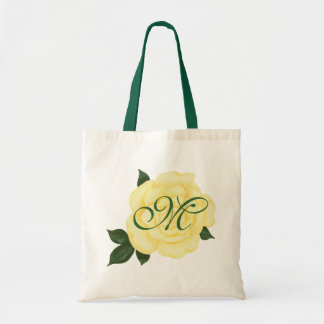Rosa amarillo, las bolsas de asas del monograma de