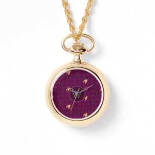 Rosado con reloj de pulsera con acento dorado