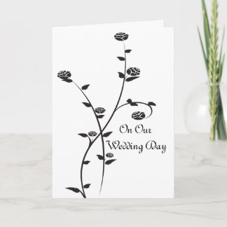 Rosas blancas y negras en nuestra tarjeta de boda