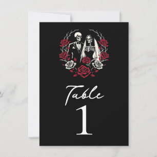 Rosas blancas y rojas esqueleto número de mesa
