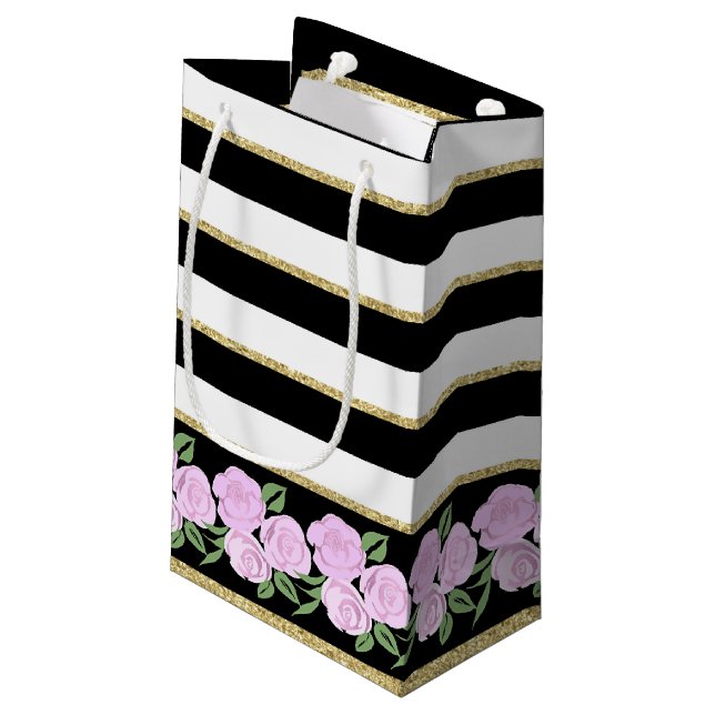 Rosas rosa blandas en negro, blanco, bolsa de rega (Angulo reverso)