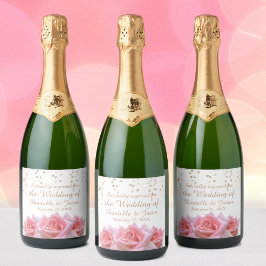 Rosas rosas rosas en la glitzy etiqueta de vino es