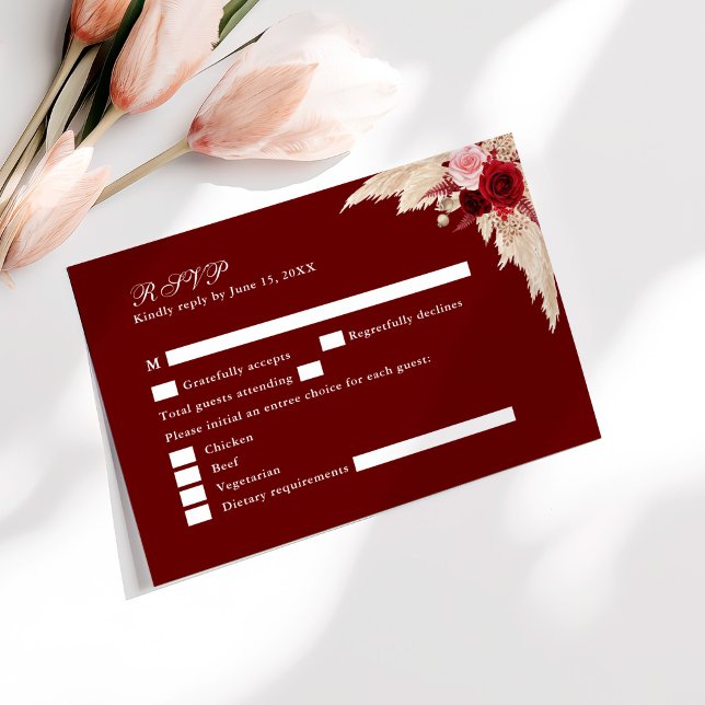 Rosas tropicales de Borgoña Boda Tarjeta RSVP (Burgundy Tropical Roses Wedding RSVP Card on a sunny table with pale pink flowers.)
