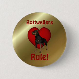 Rottweilers gobiernan botón de perro lindo