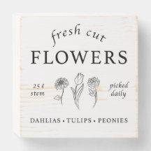 Rótulo de caja de madera con flores de corte fresc