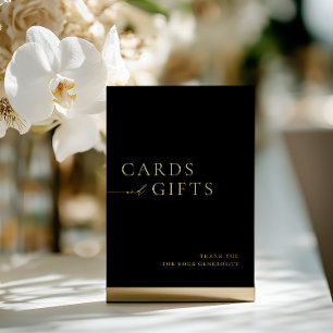 Rótulo simple de tarjetas y regalos en negro y oro
