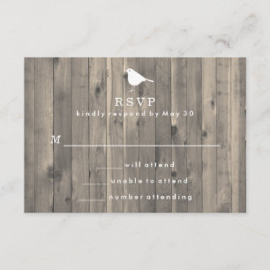 Rústico pájaro blanco sobre fondo de madera RSVP