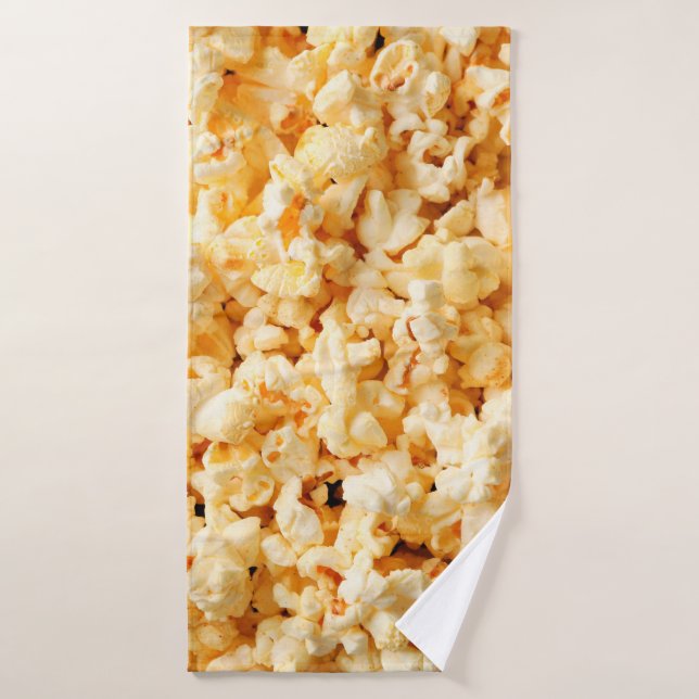 Sabrosas palomitas de maíz en todo el fondo. Alime (Toalla de baño)