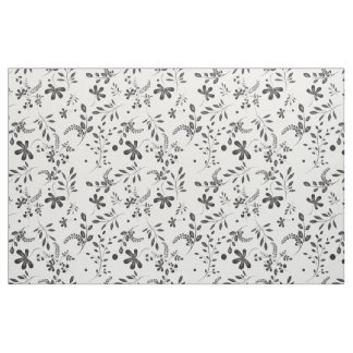 Sale negro sobre tela floral blanca