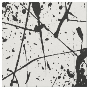 Salpicadura negra en la tela blanca