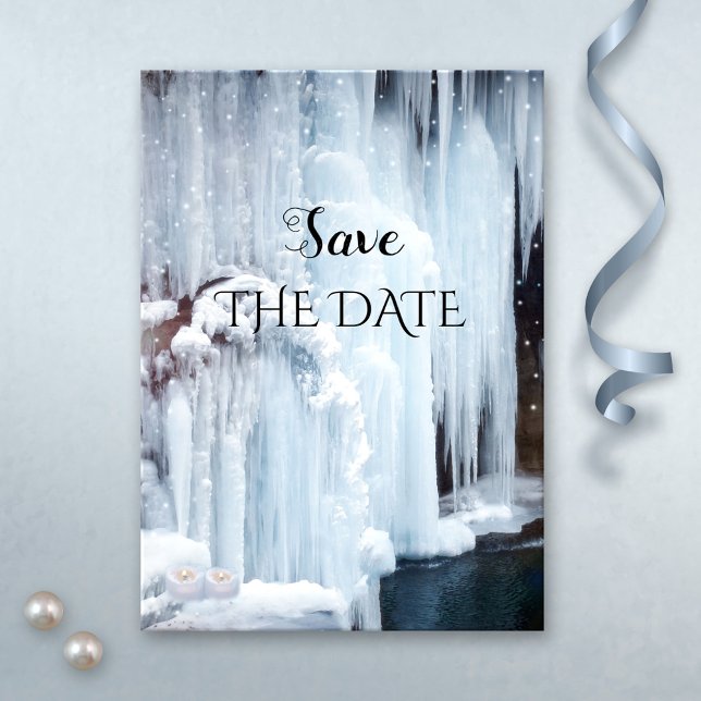 Salto de la tarjeta de fecha para la boda de invie (Winter wedding Save the Date card featuring a frozen waterfall with sparkling light snow flakes)