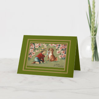 Saludos de cumpleaños de niño y perro con tarjeta