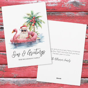 Saludos de Navidad en la Playa Tropical de Santa