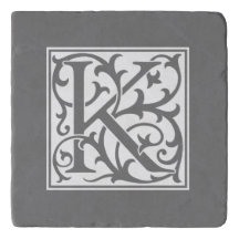 Letra inicial K blanca estilo William Morris