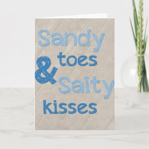 Sandy toca con la punta del pie la tarjeta salada