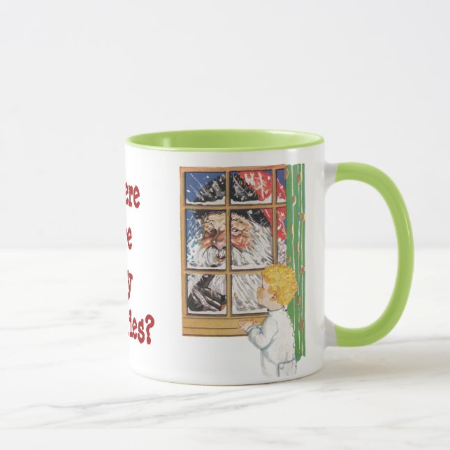 Santa antiguo que menea su taza del dedo (Derecha)