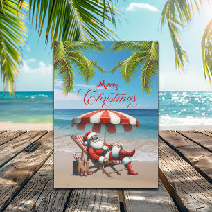 Santa bajo una sombrilla de playa Navidad