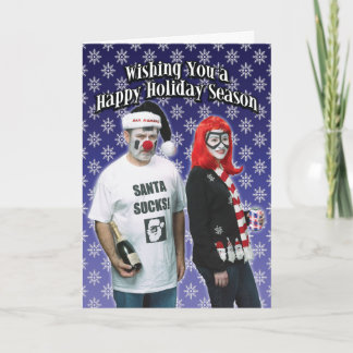 Santa chupa la tarjeta de Navidad