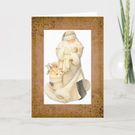 Santa Claus con tarjeta de feriado para Navidades