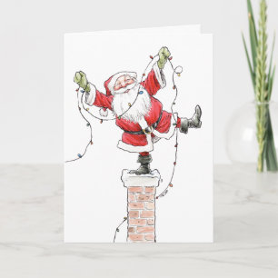 Santa con la tarjeta de las luces de navidad