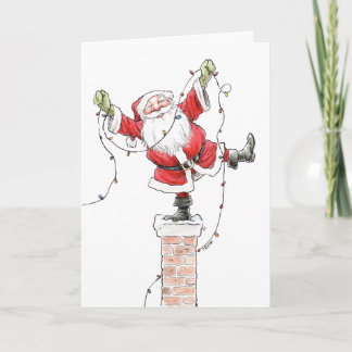 Santa con la tarjeta de las luces de navidad
