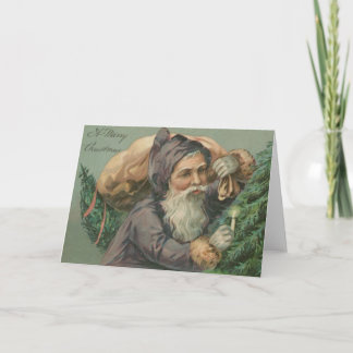 Santa con una tarjeta de Navidad del saco