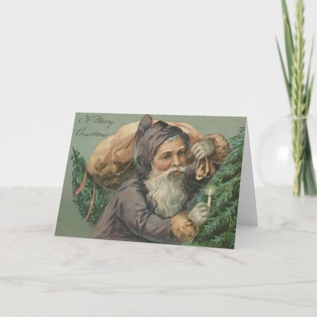 Santa con una tarjeta de Navidad del saco (Anverso)