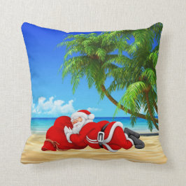 santa durmiendo en la almohada de playa