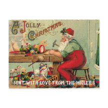 Santa en su taller haciendo juguetes Tarjeta posta
