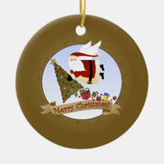Santa entrega el ornamento del navidad del |