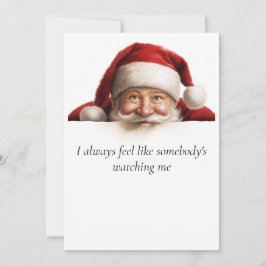 Santa está viendo tarjetas de Navidades divertidos