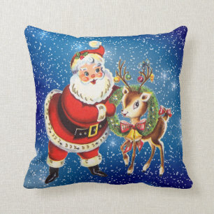 santa vintage y almohada de lanzamiento de renos