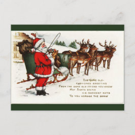 Santa y Sleigh con postal de renos