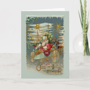 Santa y su asombrosa tarjeta de saludo de la máqui