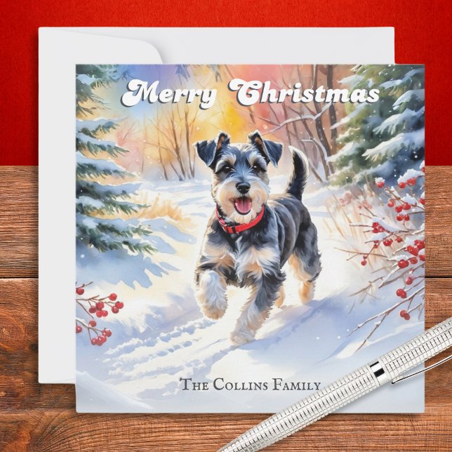 Schnauzer Miniatura en Navidad con Nieve (A personalized Christmas card with picture of a miniature schnauzer dog walking in snow)