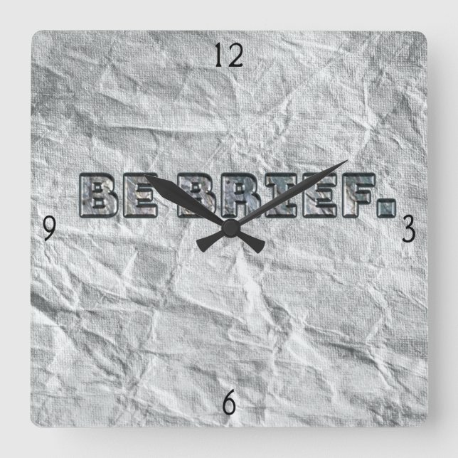 Sé Breve. Reloj de pared cuadrado (Anverso)