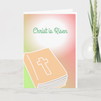 Se sube la biblia cruzada Cristo de la tarjeta de