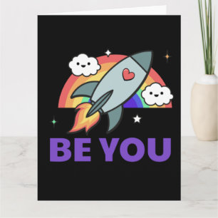 Sé tú. Nube de cohetes arco iris con tarjeta cardí