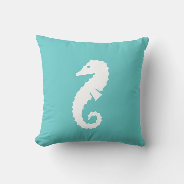 SEAHORSE BLANCO sobre almohada azul verde azulada (Anverso)
