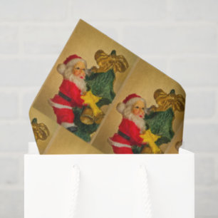 Seda Papá Noel encima del papel del árbol de Navidad