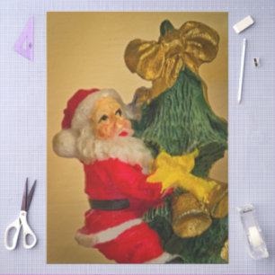Seda Santa sube el papel del árbol de navidad en el tej