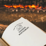 Sello De Caucho Folleto De Calavera De La Biblioteca De Su Libro D<br><div class="desc">Este sello de libro personalizado dice "de la biblioteca de" seguido de tu nombre en las capitales. Entre las dos secciones del texto, hay un ilustracion de un cráneo mágico y una rama en un libro. Un gran regalo para los amantes del libro. Visita nuestra tienda para más sellos de...</div>