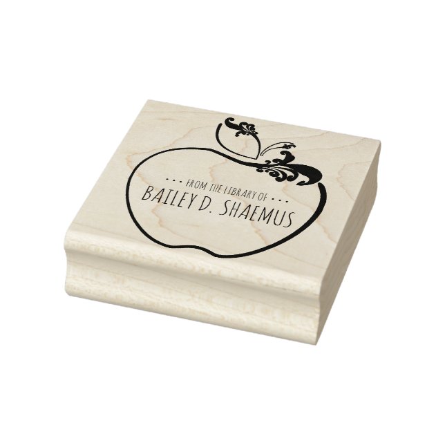 sello de manzana flourish en libro de biblioteca (Sello)