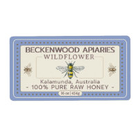 Sello de miel de abeja amarilla borde azul del ápi