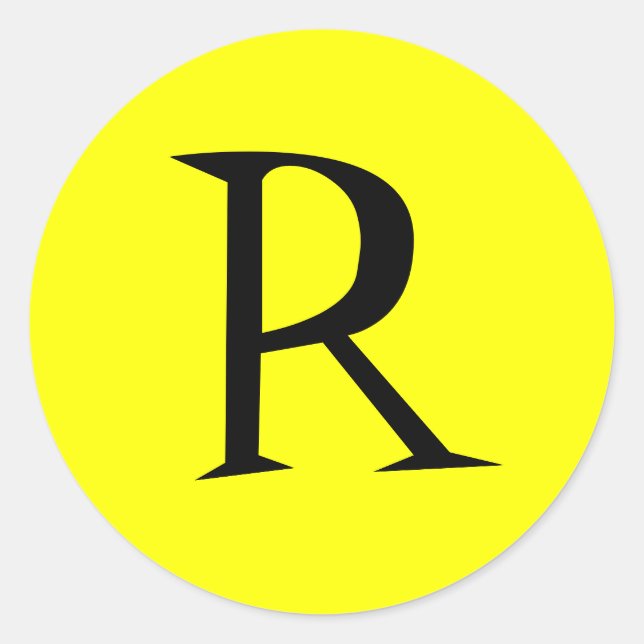 SELLO PEGATINA INICIAL AMARILLO Y NEGRO (Anverso)