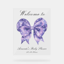 Bienvenida al baby shower con lazo de lunares