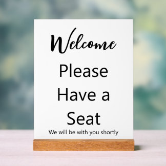Señal Acrílica Bienvenida Por favor, toma un asiento que estaremo